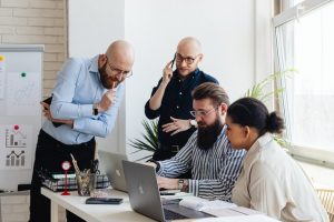 People working at a computer is the best way to announce your office relocation